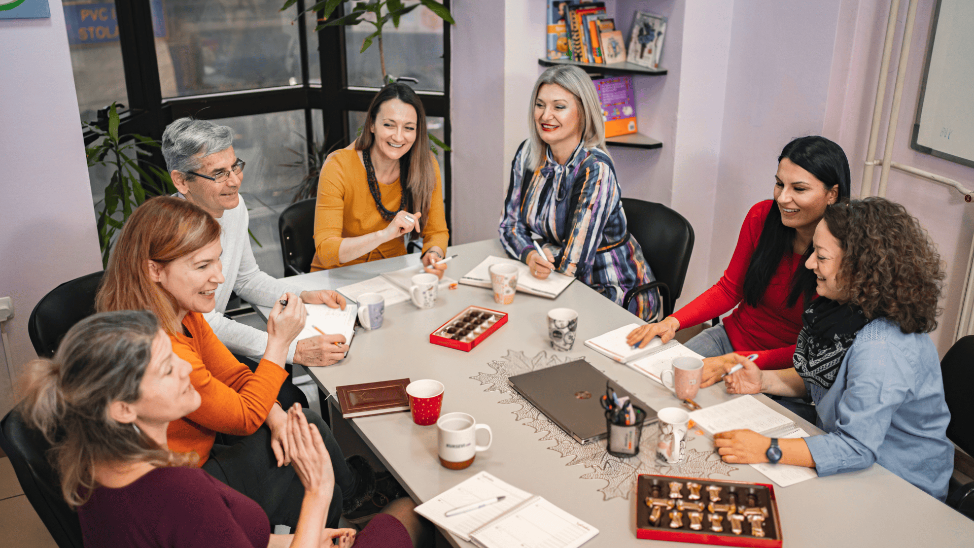 educators meeting around a conference table